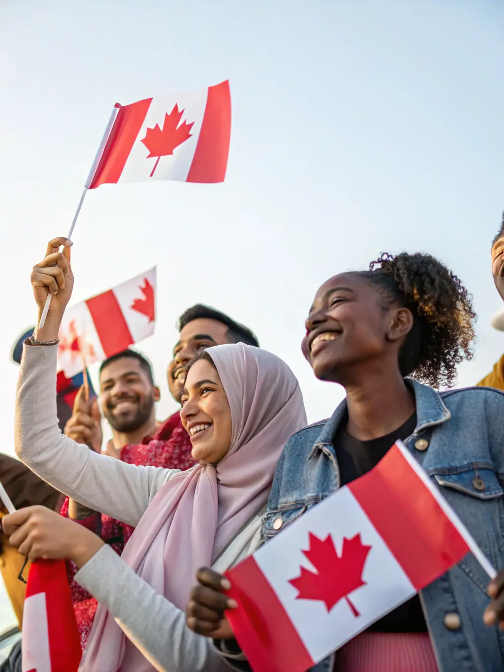 A diverse group of people standing together, representing the various nationalities INM Services IL serves.
